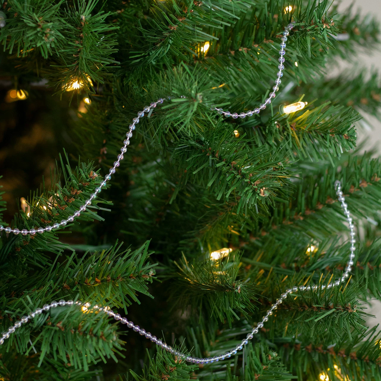 Northlight 100' X 0.25" Shiny Clear Iridescent Beaded Artificial Christmas Garland - Unlit 3 Northlight 100' X 0.25" Shiny Clear Iridescent Beaded Artificial Christmas Garland - Unlit - Image 3